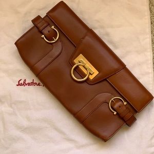 Ferragamo brown leather clutch with optional strap